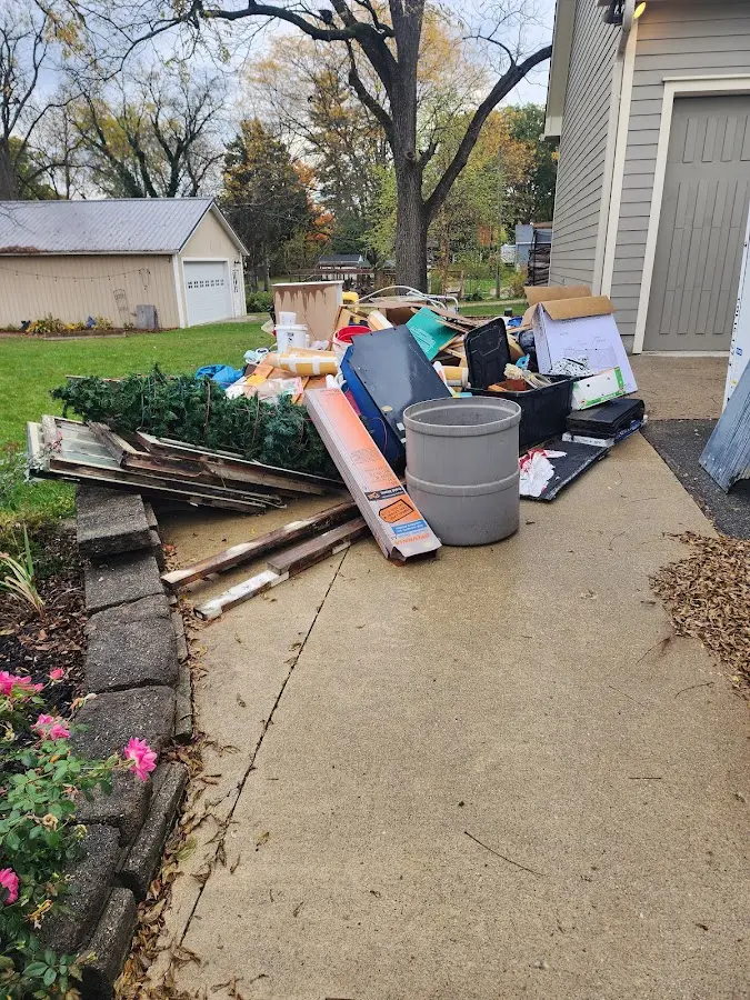 Dumpster being loaded with debris for Commercial Dumpster Rental in Tobyhanna